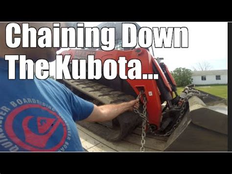 how to chain down a skid steer|chain skid steer to trailer.